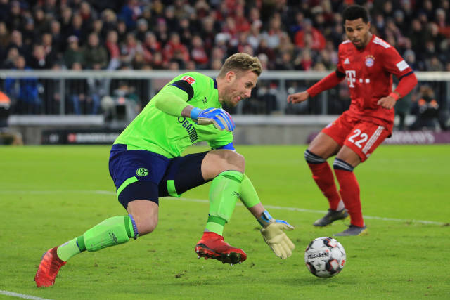 他在激烈競 他在激烈競